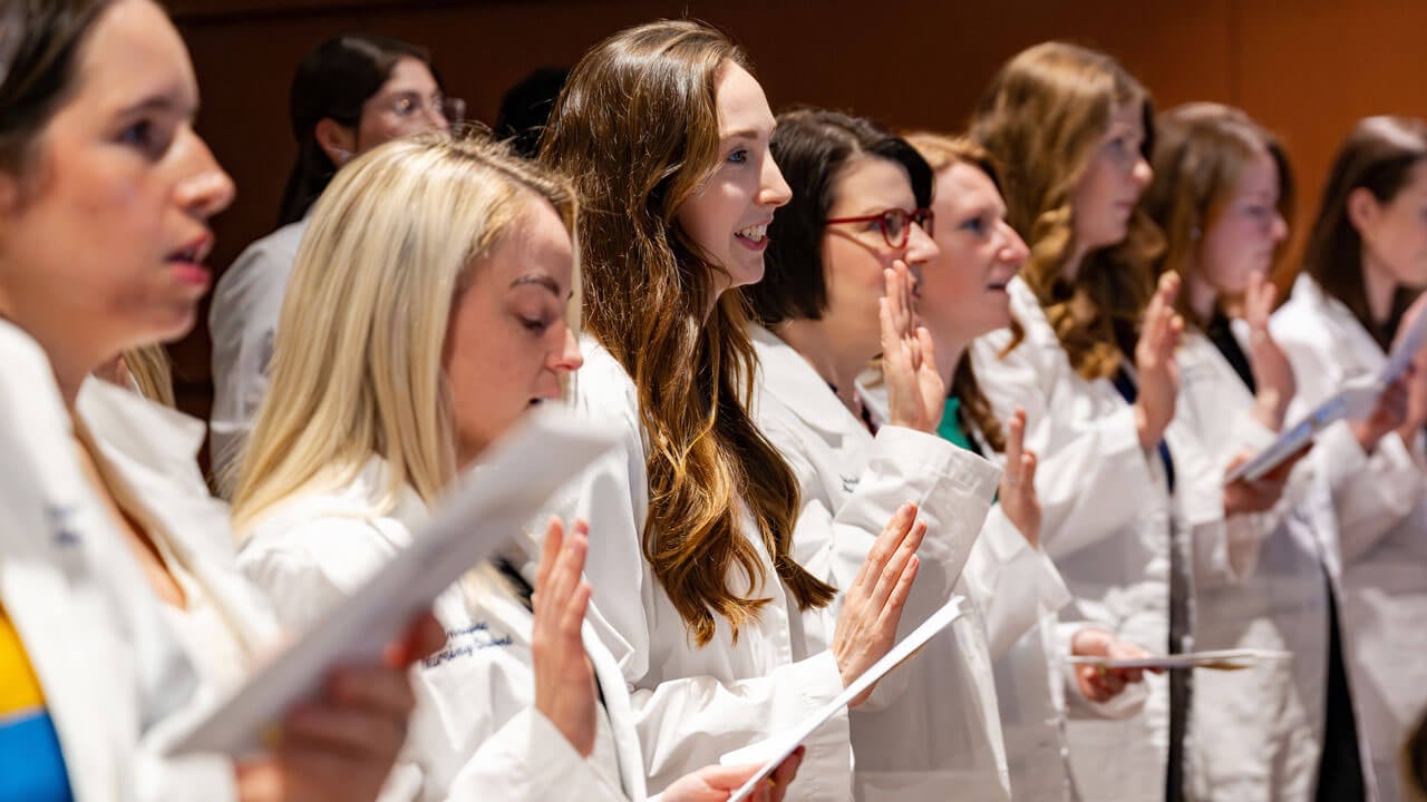 Nursing students take oath during White Coat Ceremony