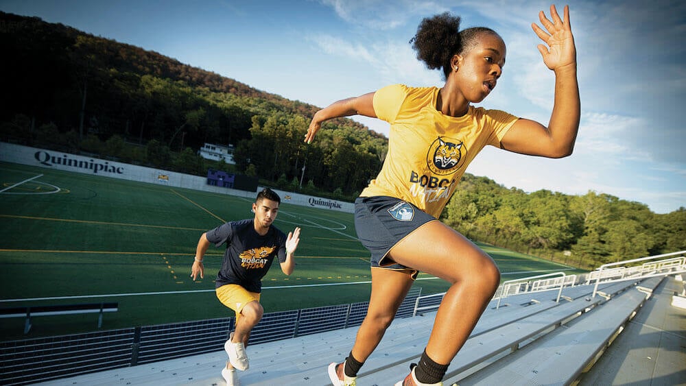 Students work out in the Quinnipiac Soccer Turf Complex